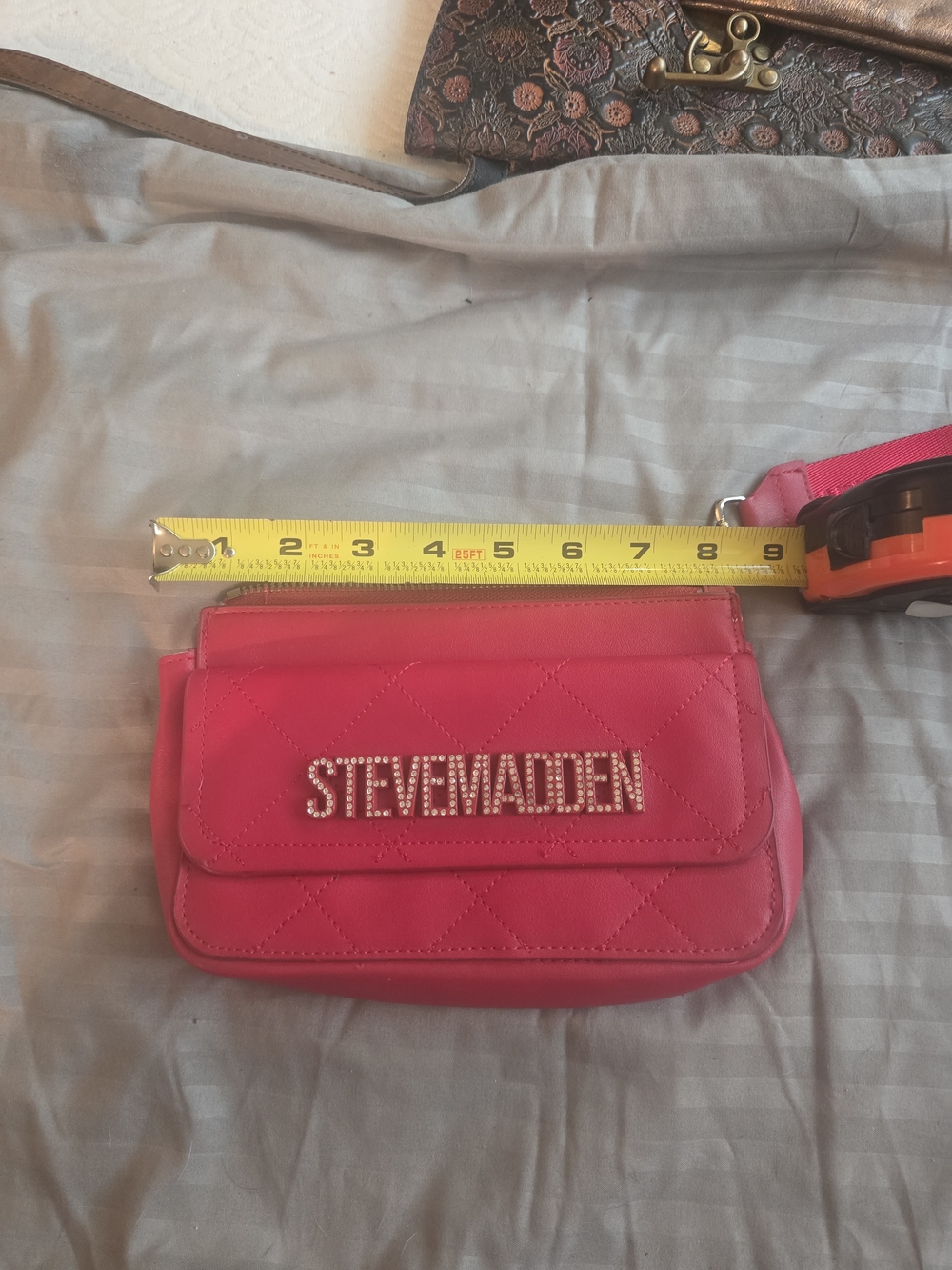 Steve Madden Red Quilted Wristlet with Rhinestone Logo
